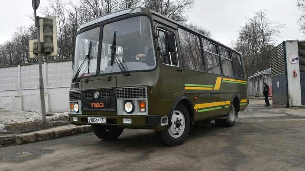 Buses drive out of the the Russian Government airport Vnukovo