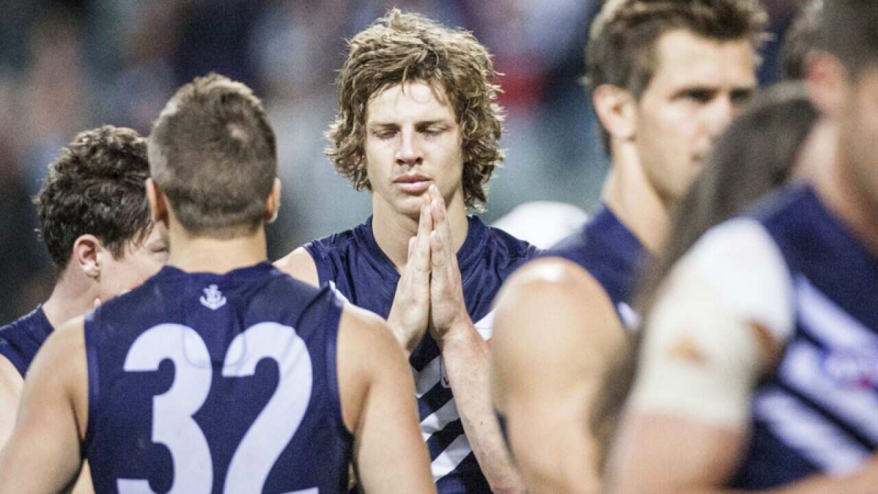 Nat Fyfe of the Fremantle Dockers reacts