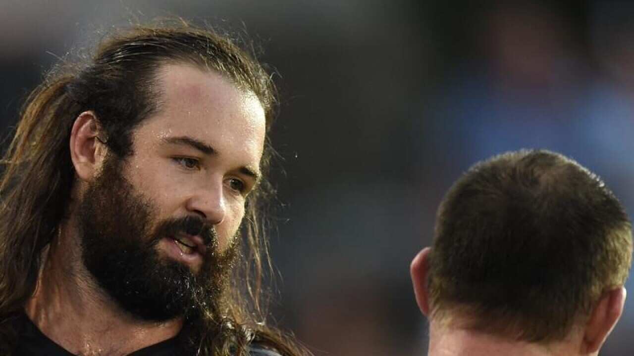 Aaron Woods and Paul Gallen