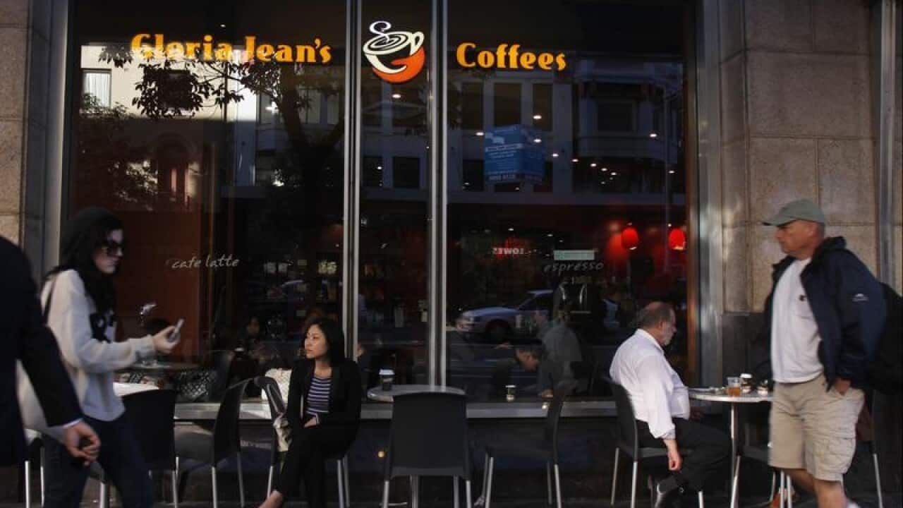 Customers at a Gloria Jean's Coffees shop