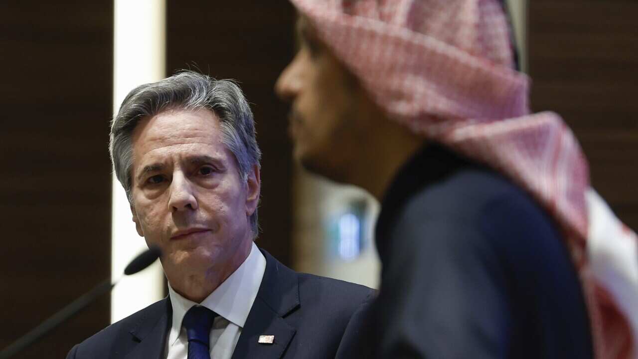 U.S. Secretary of State Antony Blinken, left, and Qatar's Prime Minister and Foreign Minister Sheikh Mohammed bin Abdulrahman Al Thani attend a press conference, during Blinken's week-long trip aimed at calming tensions across the Middle East, in Doha, Qatar, Sunday, Jan. 7, 2024.