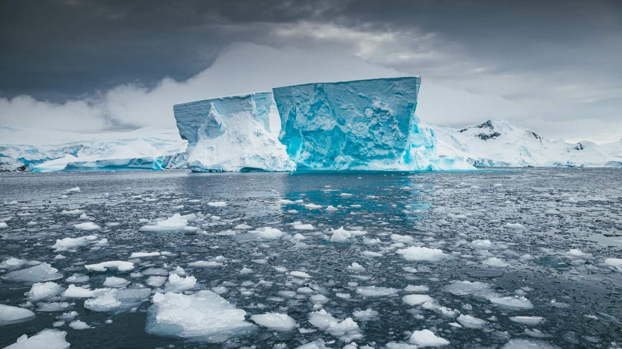 Iceberg sits still on a calm day in Antarctica