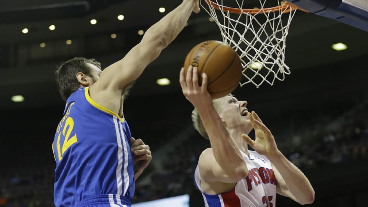 Detroit'S forward Kyle Singler and Golden State Warriors Andrew Bogut