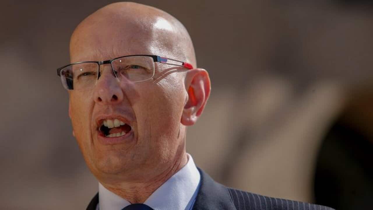 Opposition Minister for Imigration, Shayne Neumann