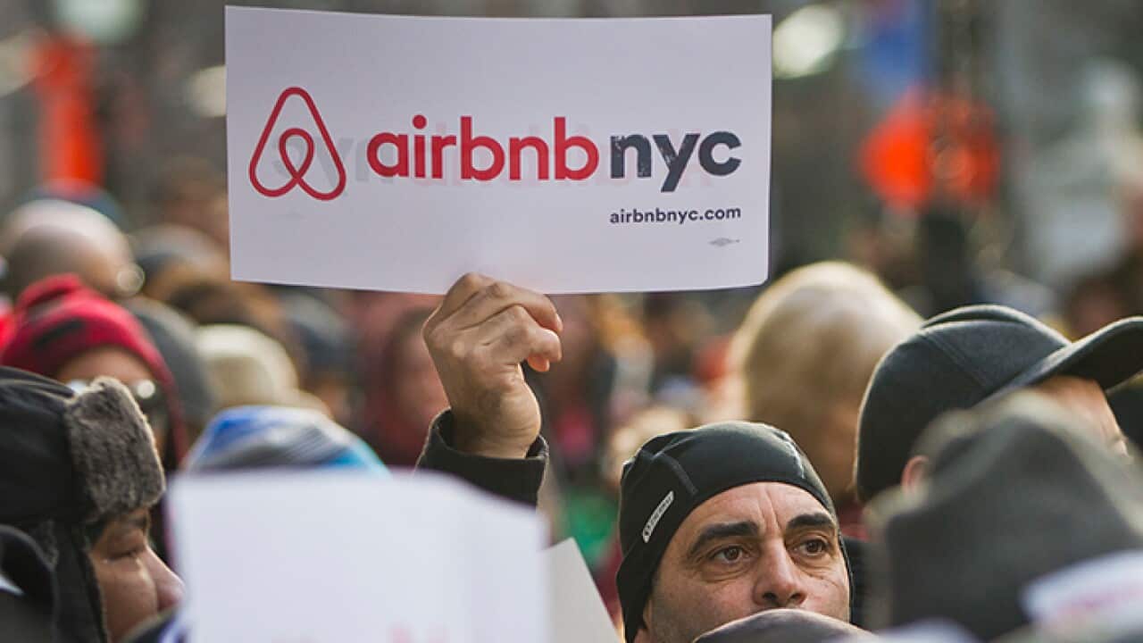 Airbnb sign in a protest