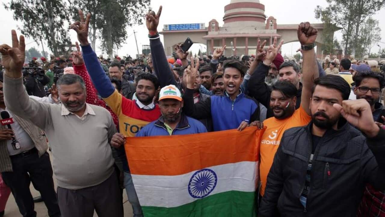 People gathered at Wagah border ahead of the arrival of Indian pilot.