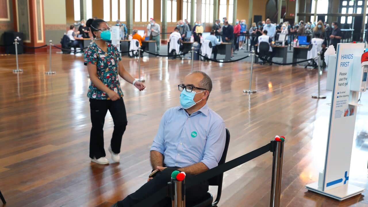 Acting Victorian Premier James Merlino receives a Covid-19 booster vaccination at the Royal Exhibition Building in Melbourne, Thursday, December 23, 2021. (AAP Image/Pool, David Crosling) NO ARCHIVING