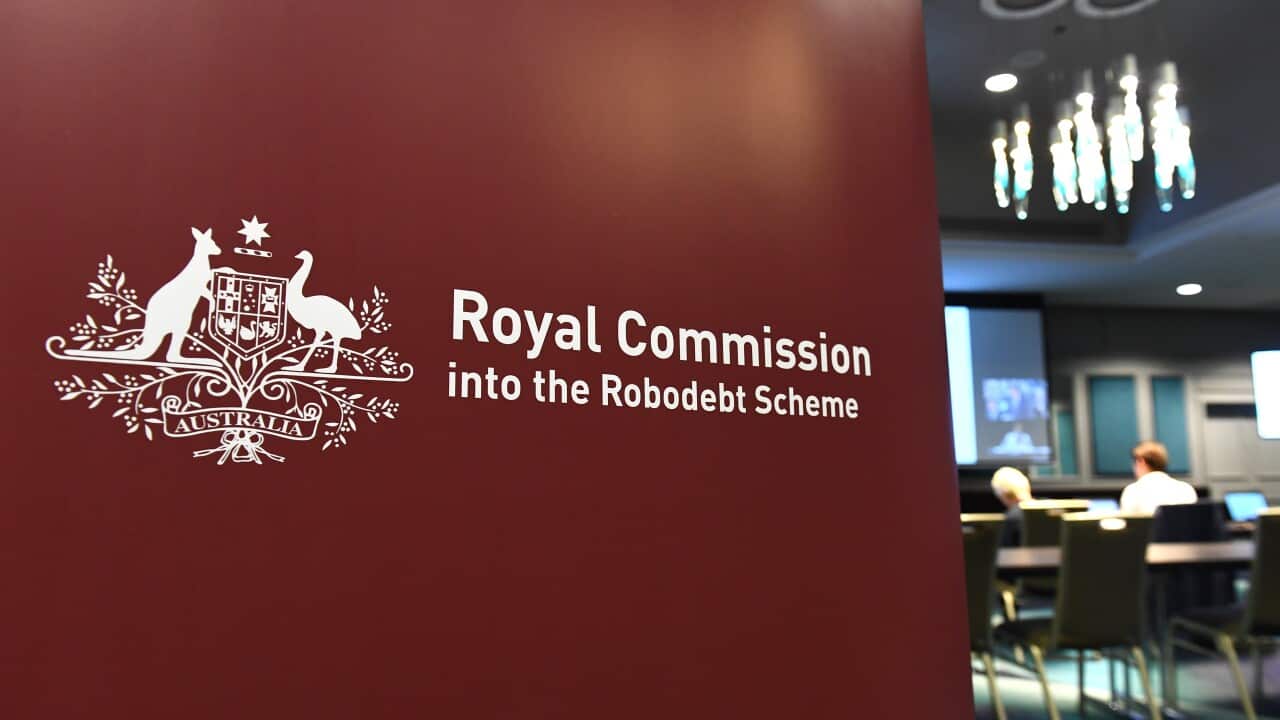 Signage that reads Royal Commission into the Robodebt Scheme.
