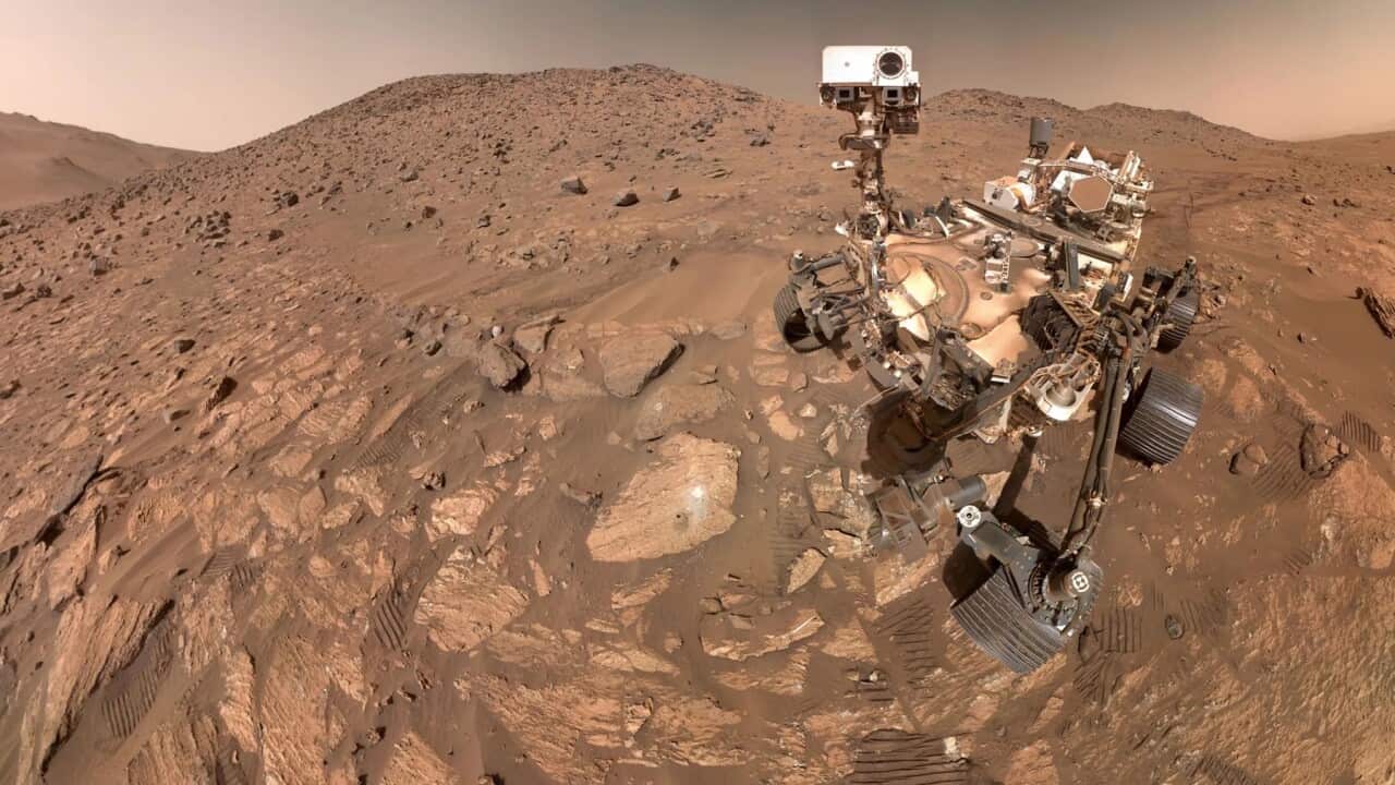 Perseverance selfie with Cheyava Falls on the surface of Mars (NASA supplied image).jpg