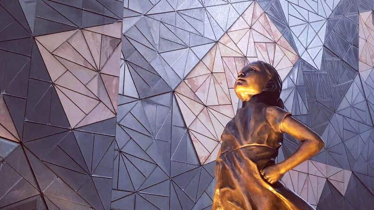 A copy of the famous sculpture Fearless Girl is currently in Federation square, Melbourne.