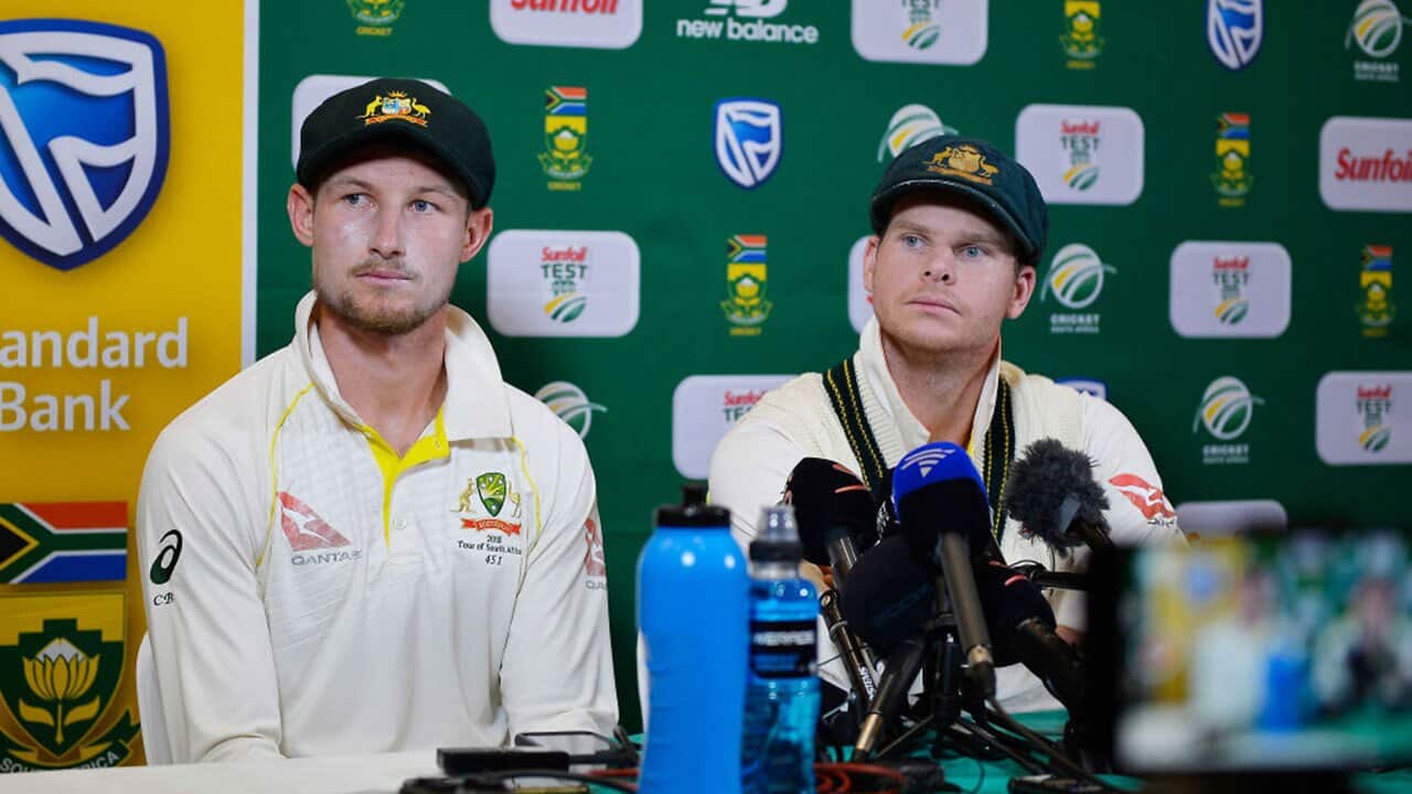 Steven Smith (capt) and Cameron Bancroft (L) of Australia 
