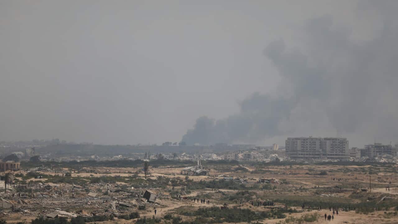 Smoke and dust rising over the destroyed and heavily damaged residential areas following the Israeli attacks on western Gaza City,