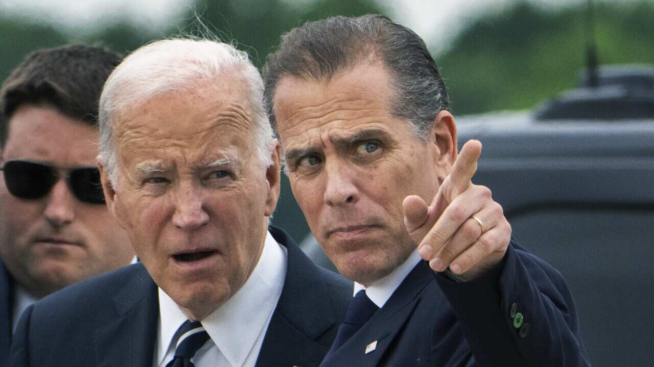 President Joe Biden talks with his son Hunter Biden as he arrives Delaware Air National Guard Base in New Castle, Del., Tuesday, June 11, 2024.