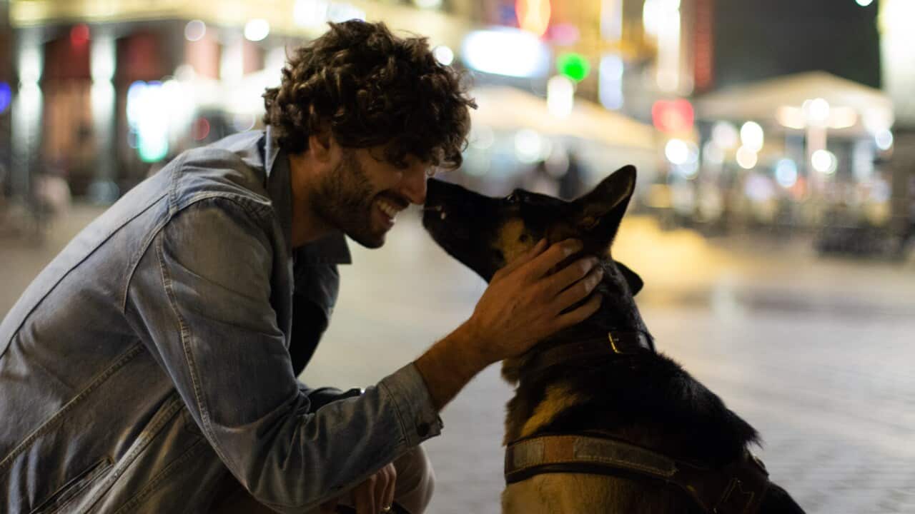 Arthur Aumoite and his guide dog Loya.