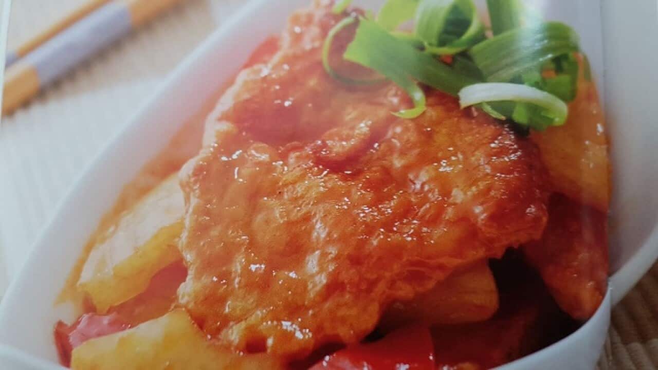 Pork chop in tomato sauce and pineapple