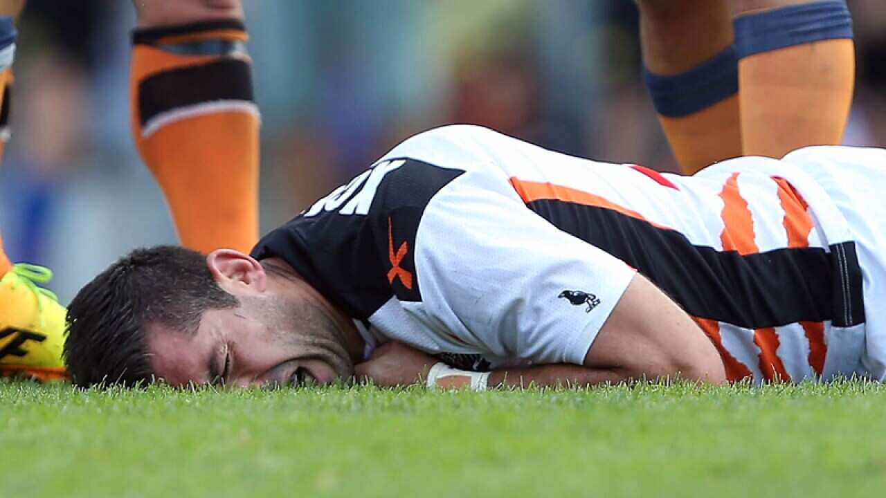 Wests Tigers five-eighth Braith Anasta in pain.
