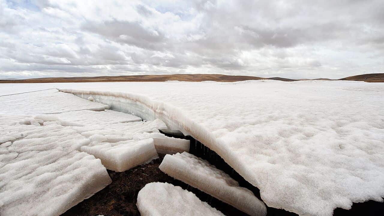 Ice melts in the source region of China's Yellow River outside of Maduo on the Qinghai-Tibet plateau, known as the 'Roof of the World.