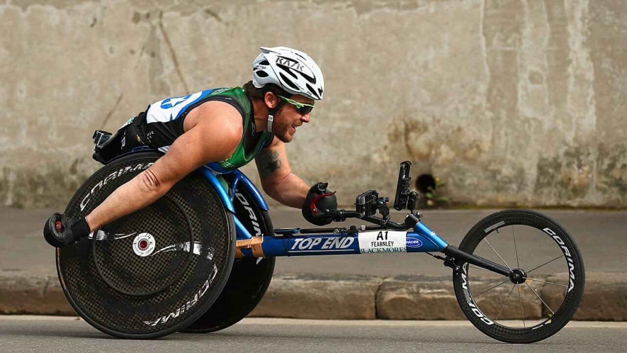 Kurt Fearnley competes in the Sydney marathon during the Blackmores Sydney Running Festival.