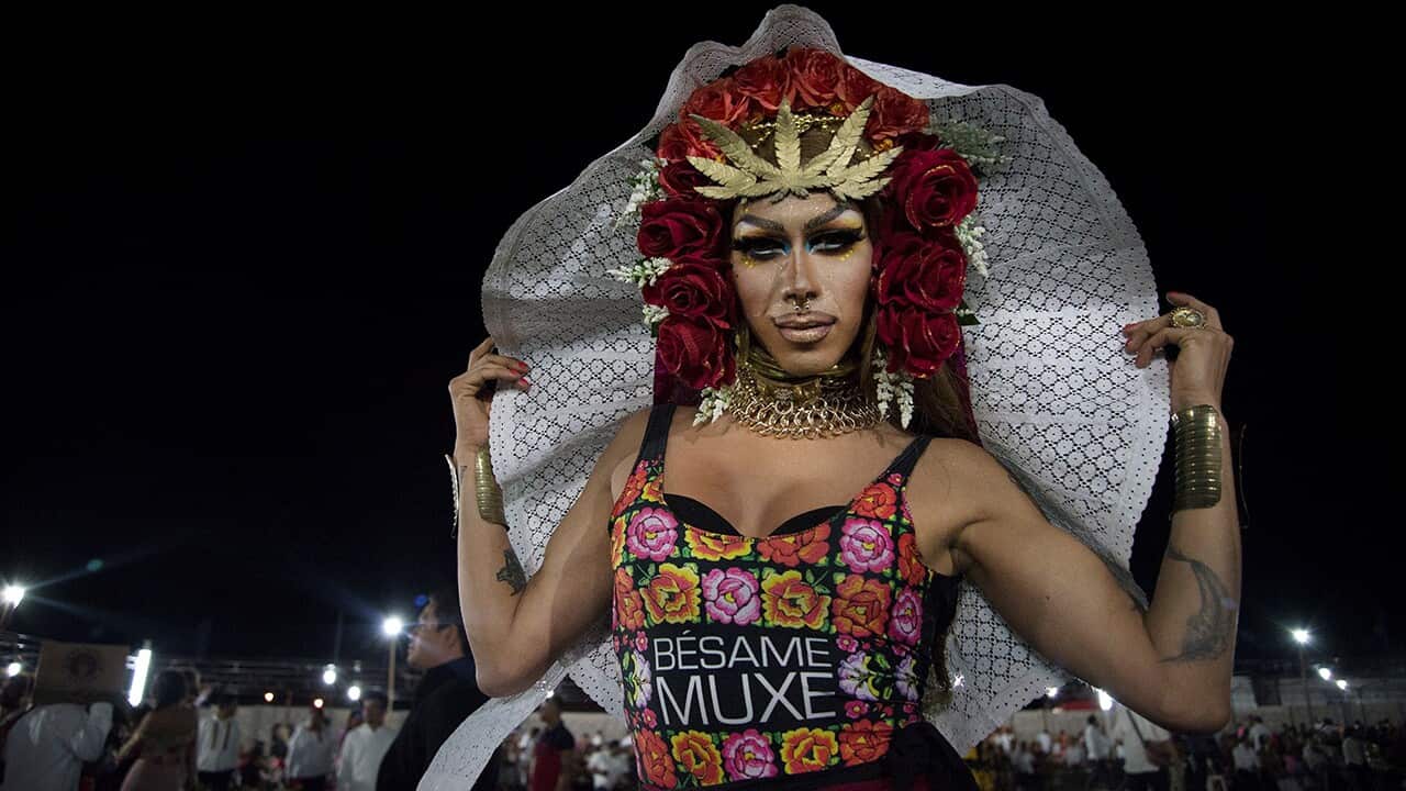 A pageant member poses for the camera