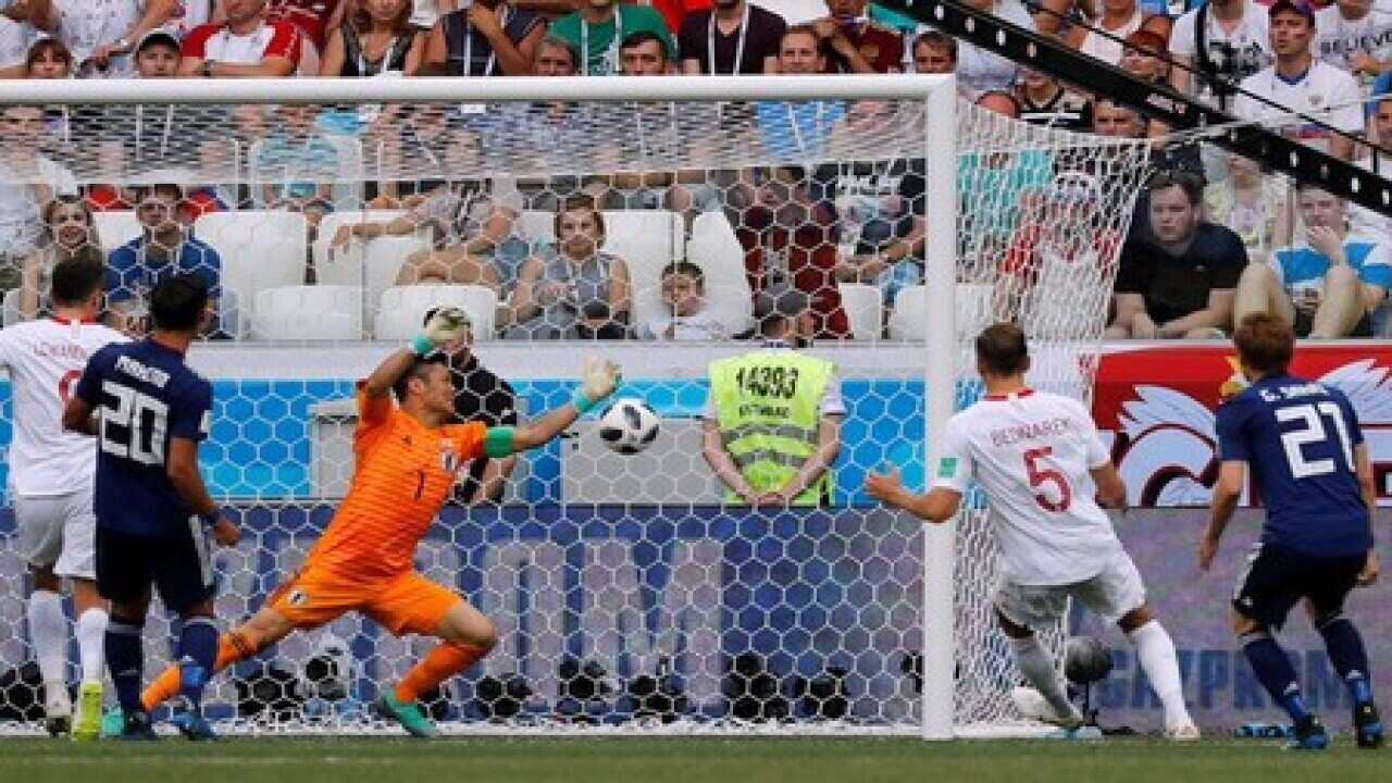 Japan slip through to last 16 despite Poland loss