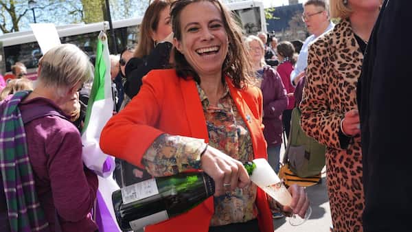 Supporters cheer UK court's historic ruling on the legal definition of a woman image