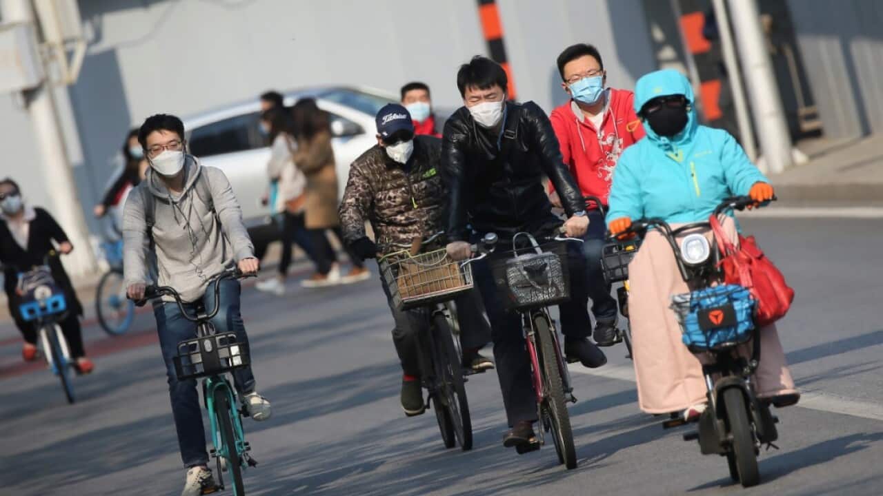 People wearing face mask are seen in Beijing, China on April 17, 2020, amid an outbreak of the new coronavirus COVID-19