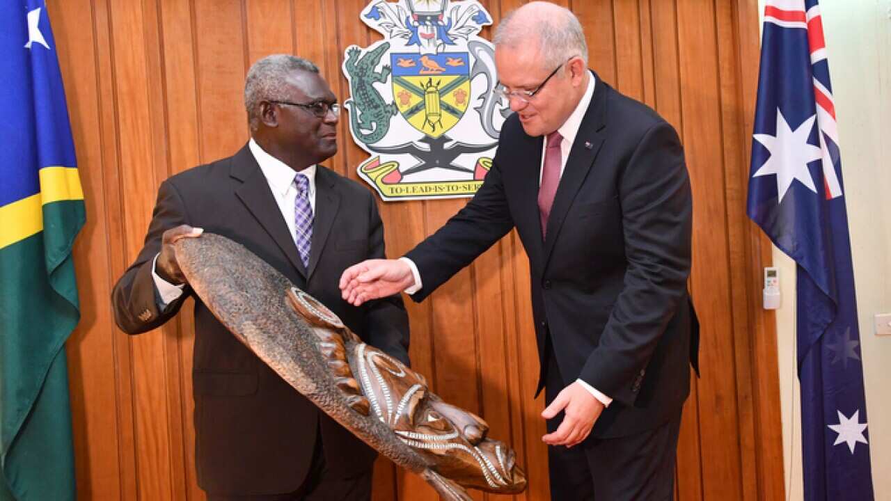 Solomons Islands Prime Minister Manasseh Sogavare (left) and Australian Prime Minister Scott Morrison meeting in Honiara.