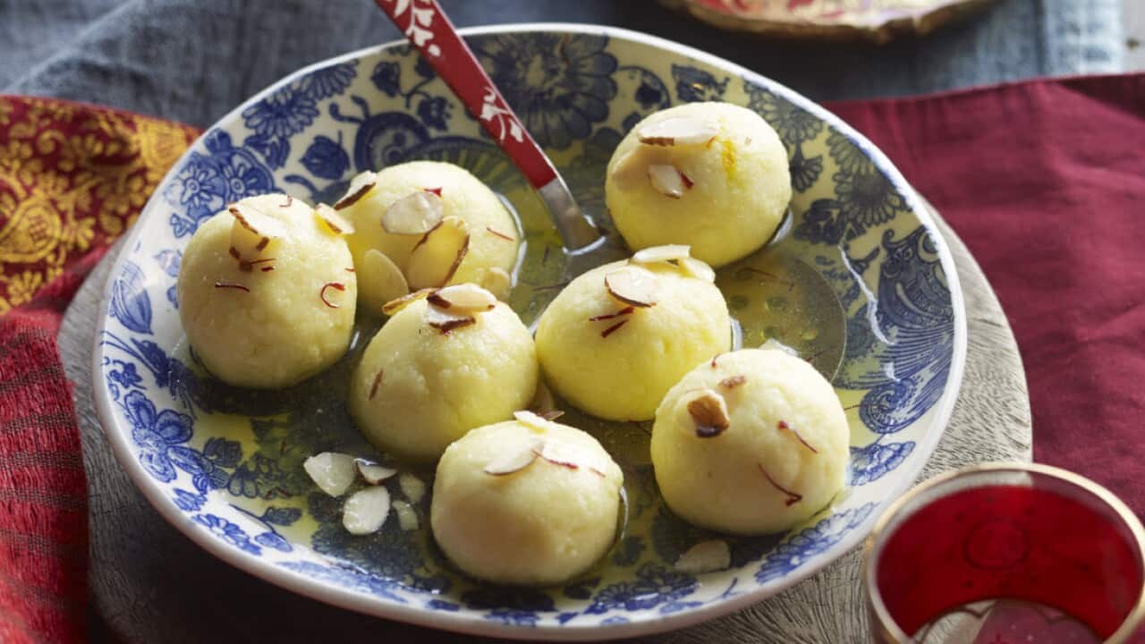 Paneer balls in saffron sugar syrup (rasgulla)