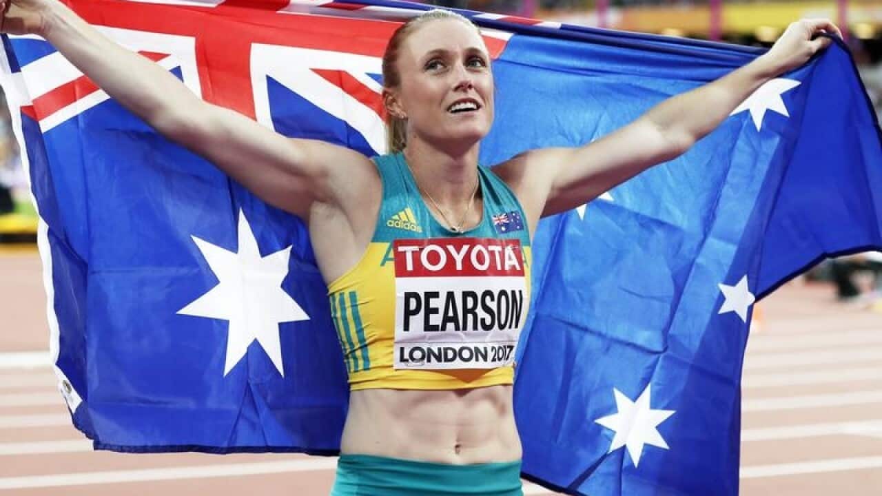 Sally Pearson celebrates after winning the world title