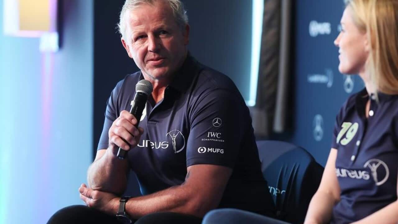 Former All Blacks captain Sean Fitzpatrick (L)