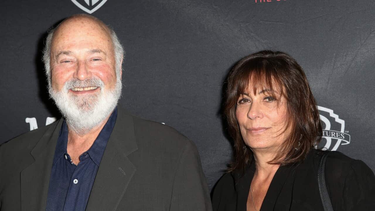 Rob and Michele Reiner in front of a black background