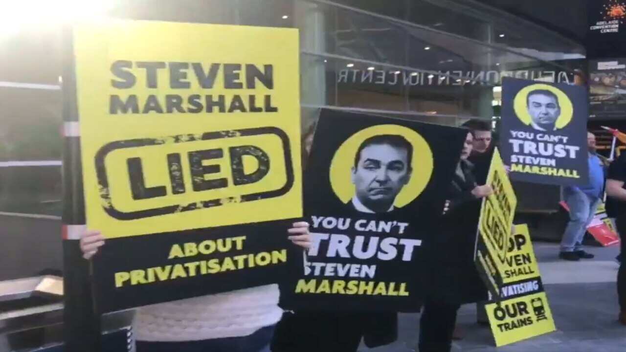 Protesters gather outside the Adelaide Convention Centre to express their displeasure with SA Premier Steven Marshall and Prime Minister Scott Morrison.