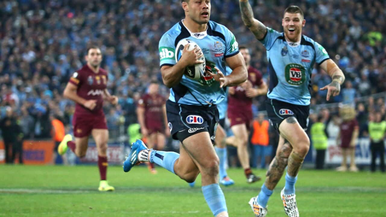 Jarryd Hayne carries the ball to victory ending Game II
