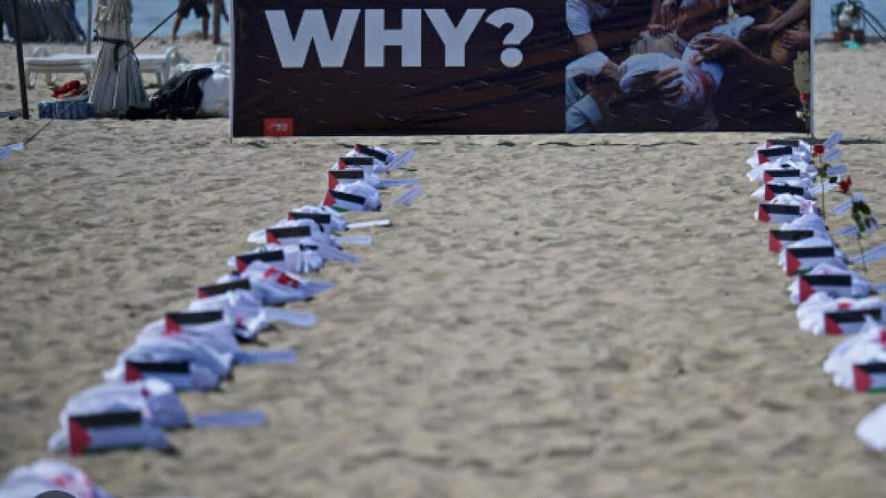 huma aid 4killed Carl DE SOUZA AFP.jpg