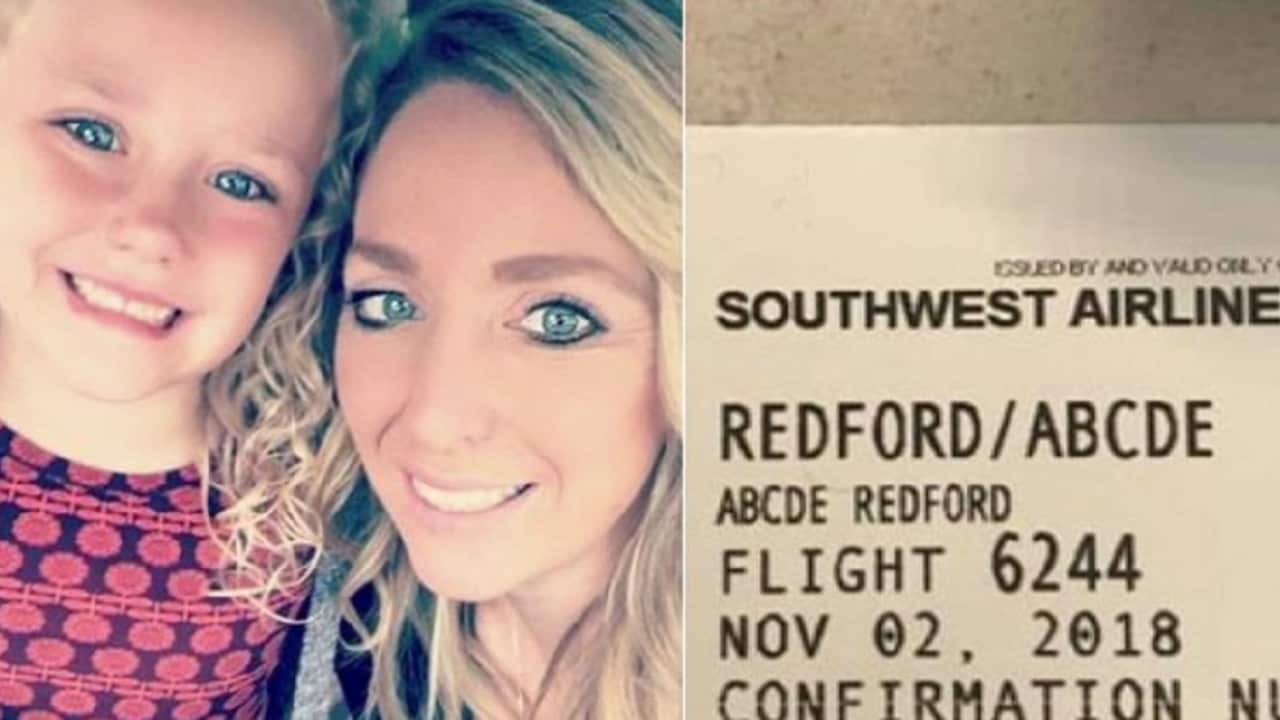 Abcde and Traci Redford with the boarding pass.