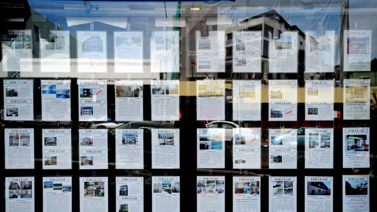 Houses for lease advertised in the window of a real estate agent (AAP).