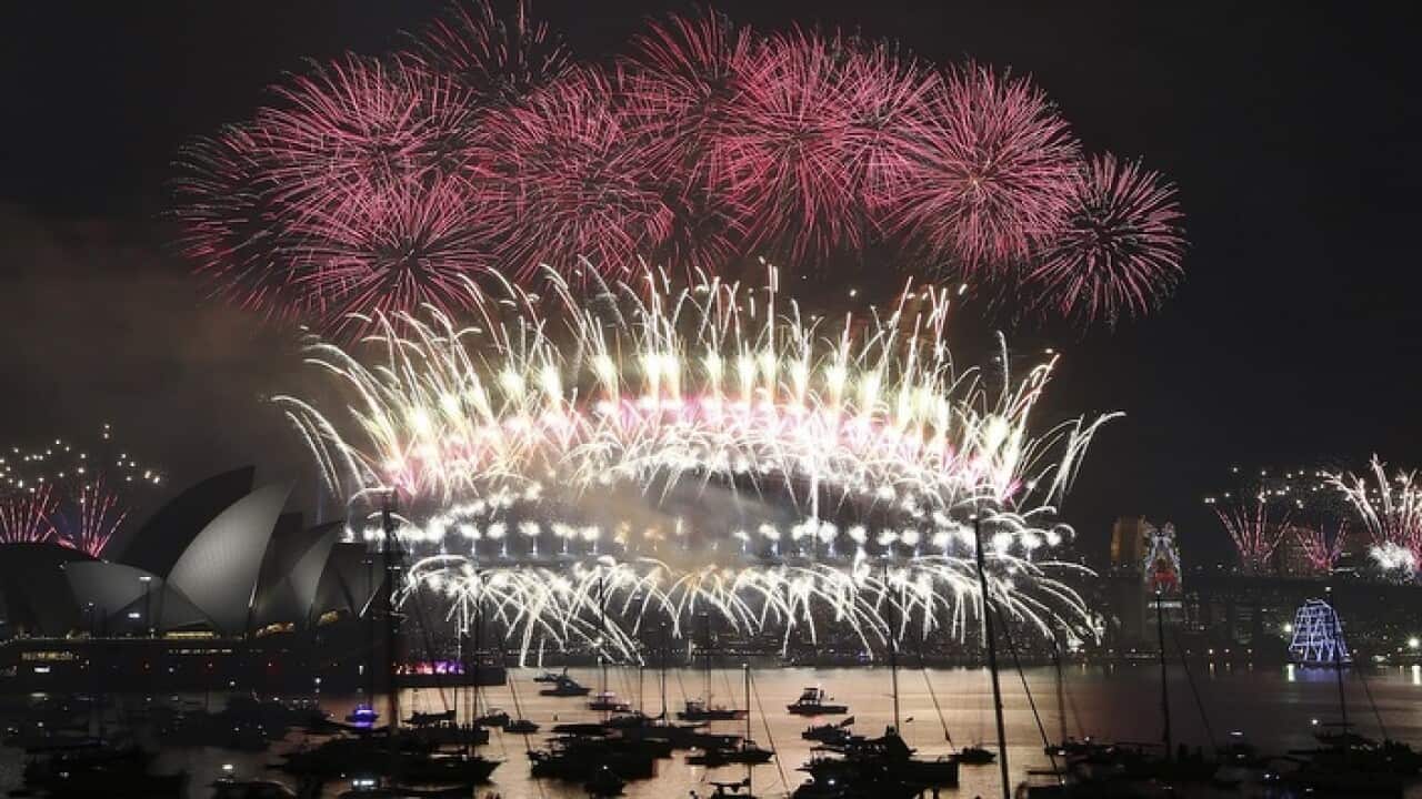 Fireworks explode over the Opera House and Harbour Bridge during New Year's Eve fireworks display in Sydney, Australian, Friday, Jan. 1, 2016.(AP Photo/Rob Griffith)