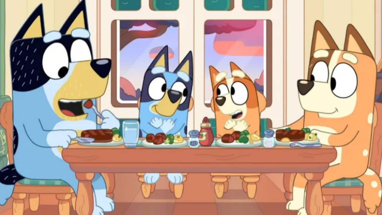 Cartoon characters sitting at a dining table