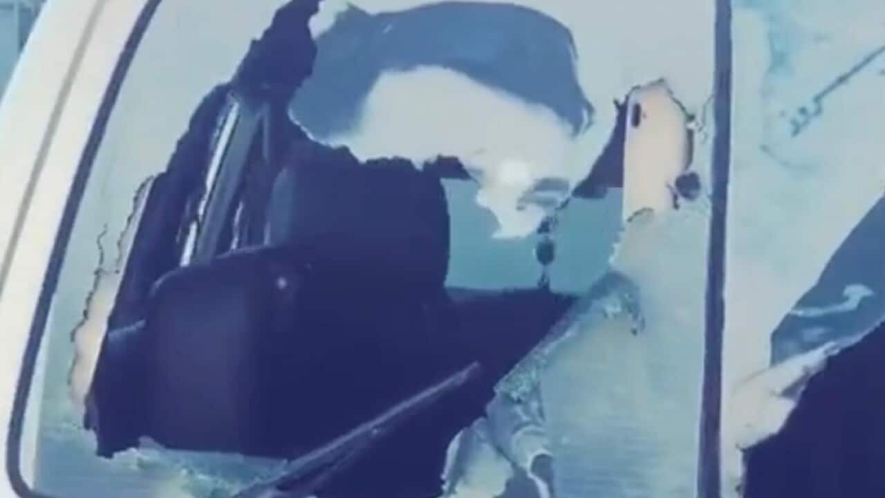 The guard's bullet-ridden car