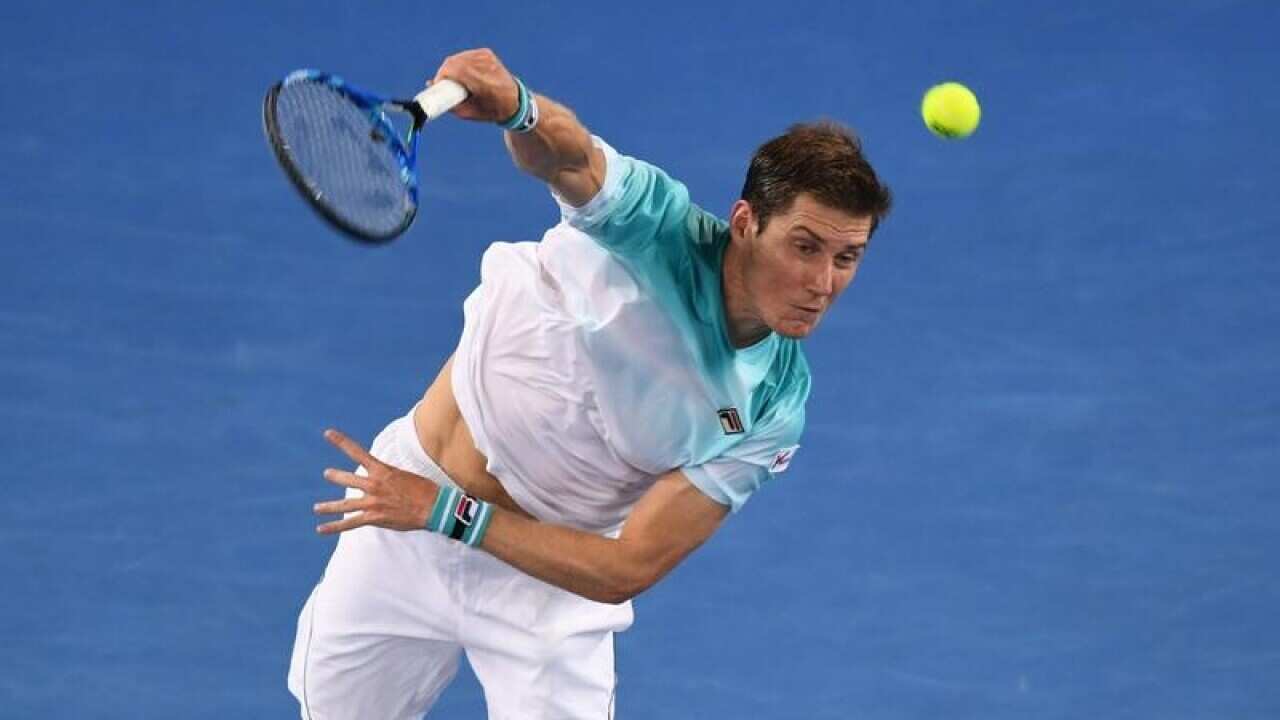 Matthew Ebden of Australia in action against Alexandr Dolgopolov.