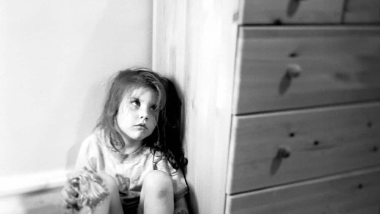 Girl Hiding in Corner