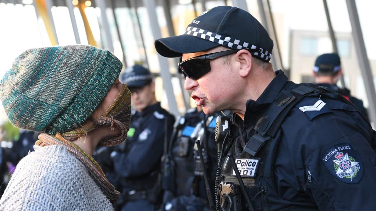 Environmental protesters clash with Police outside the Melbourne Exhibition and Convention Centre, Melbourne, Tuesday, October 29, 2019. 