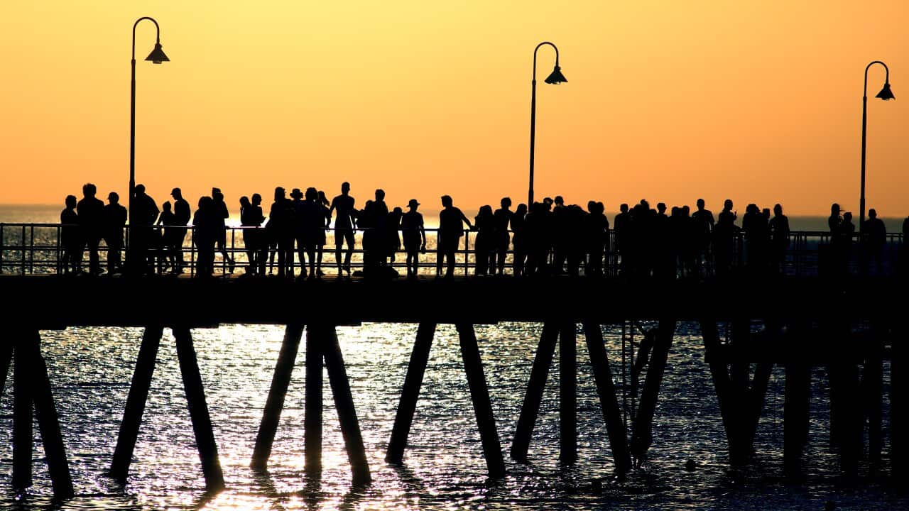 Beachgoers are seen at Bondi Beach in Sydney
