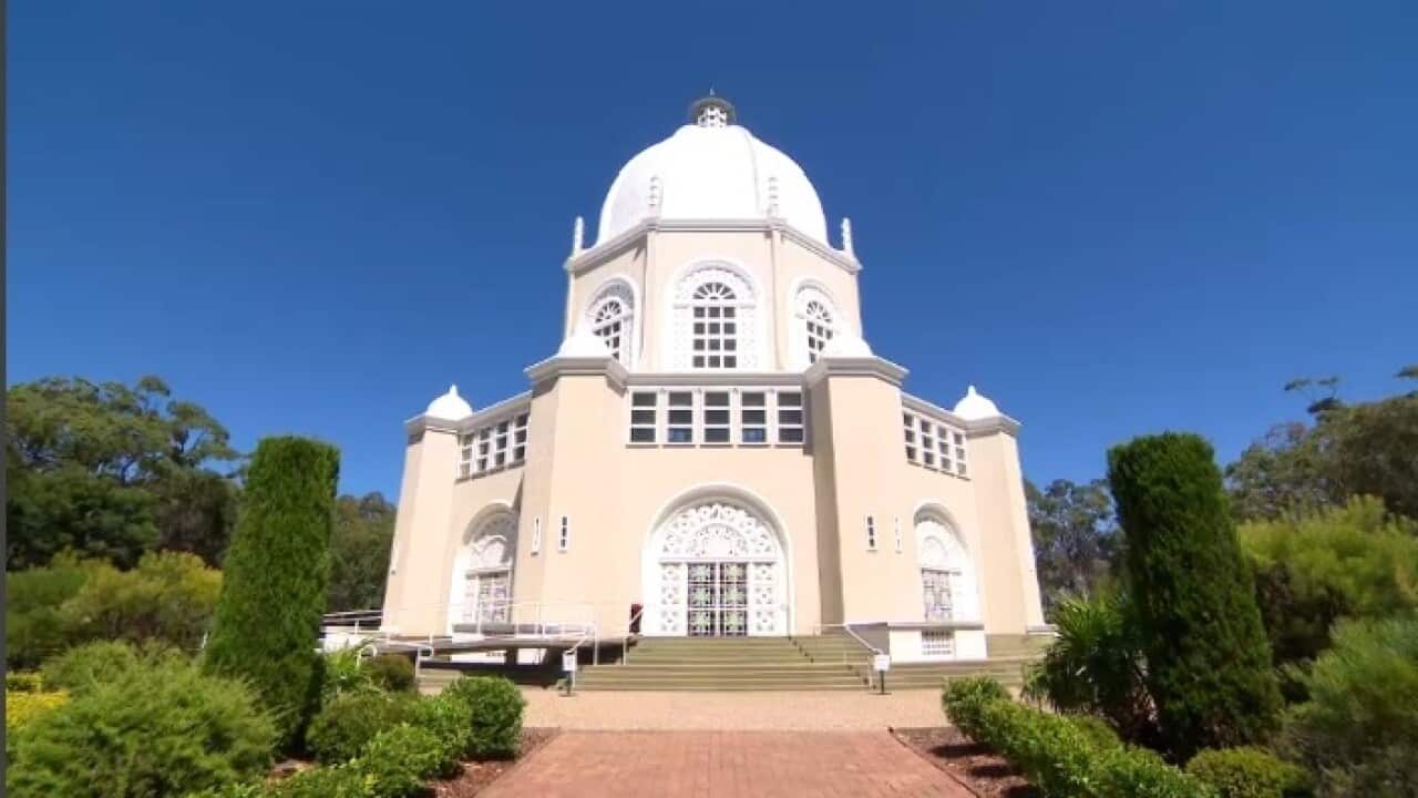 The serenity of the Bahai temple in Sydney belies its followers fears for family in Yemen (