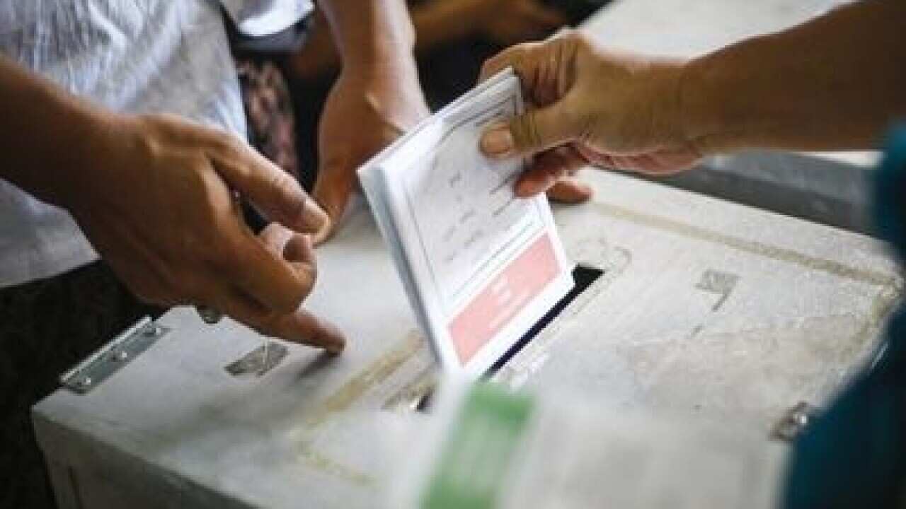 Indonesia_hands_ballot.jpg