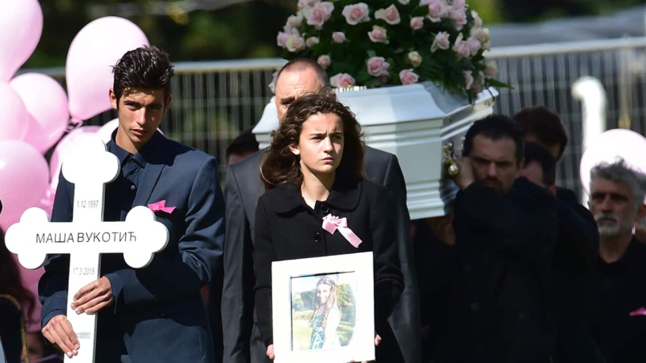 Family members lead the coffin of Masa Vukotic