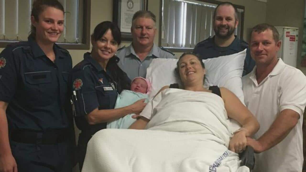 A baby was born at a Whitsundays ambulance station after Cyclone Debbie stopped its parents from reaching a hospital.