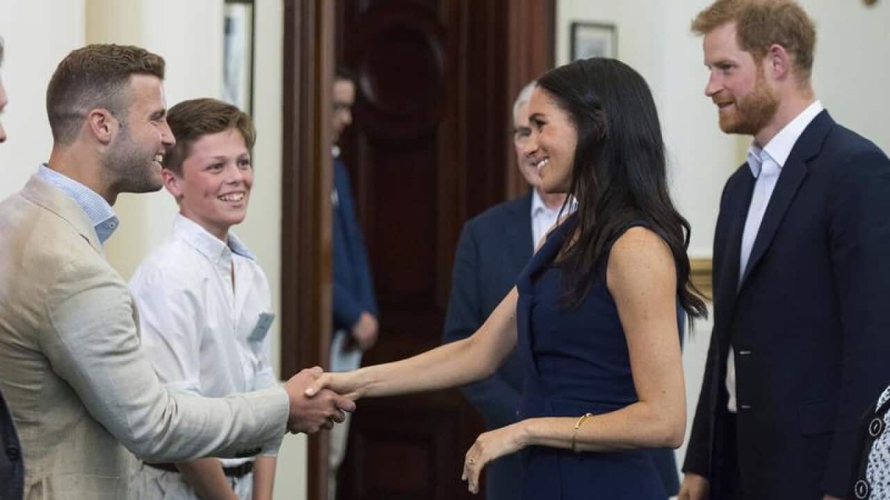 Meghan and Harry meet mental health advocate Hunter Johnson.