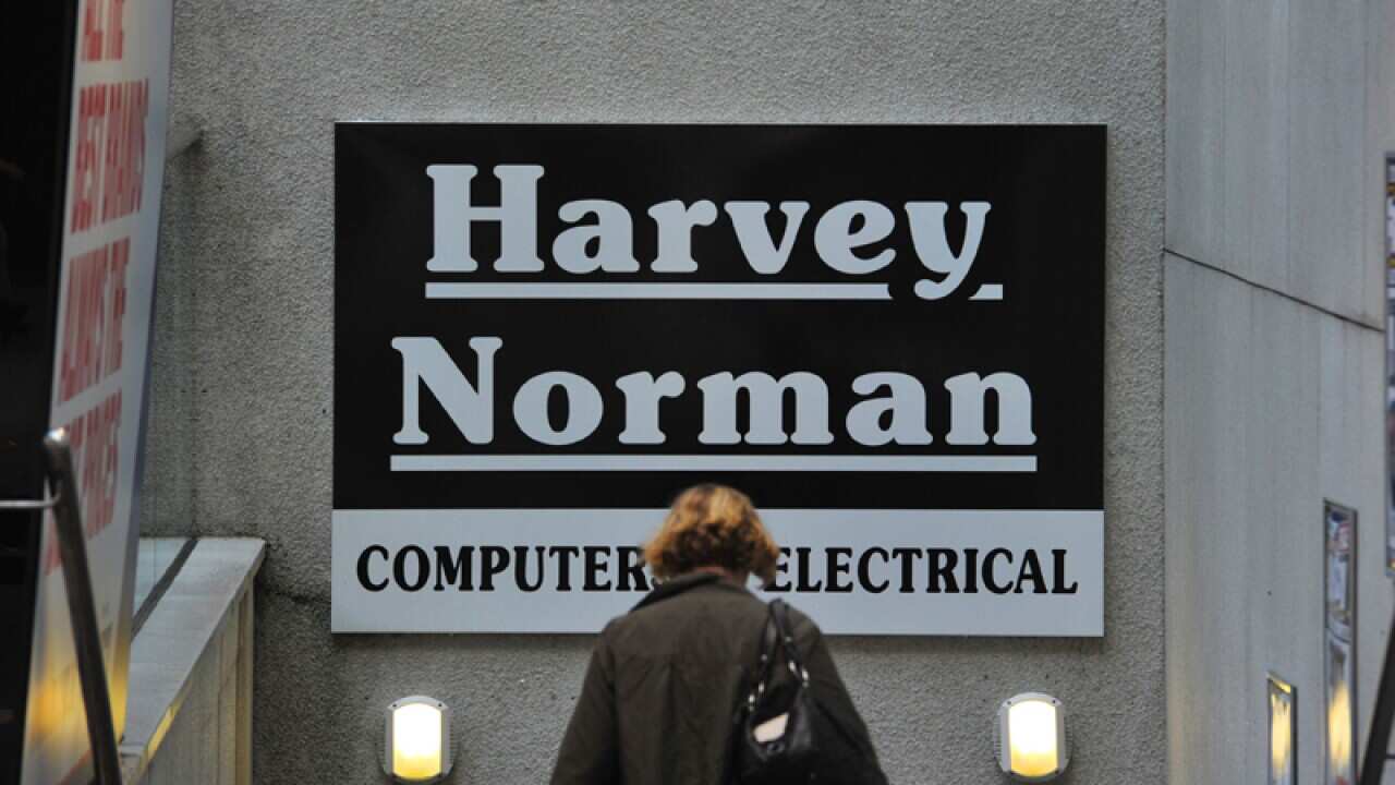 Signage outside a Harvey Norman retail store in Sydney