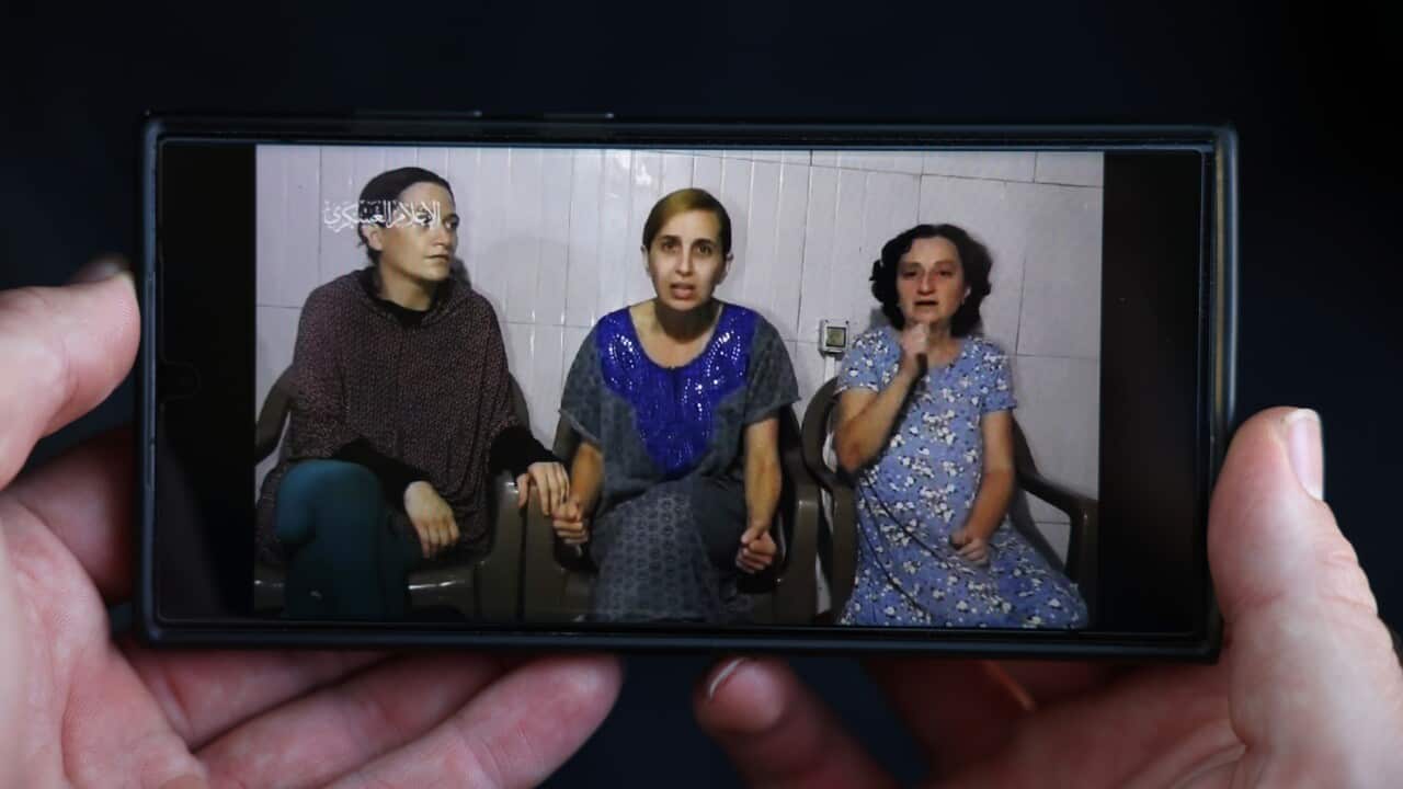Three women seen on an iPhone screen